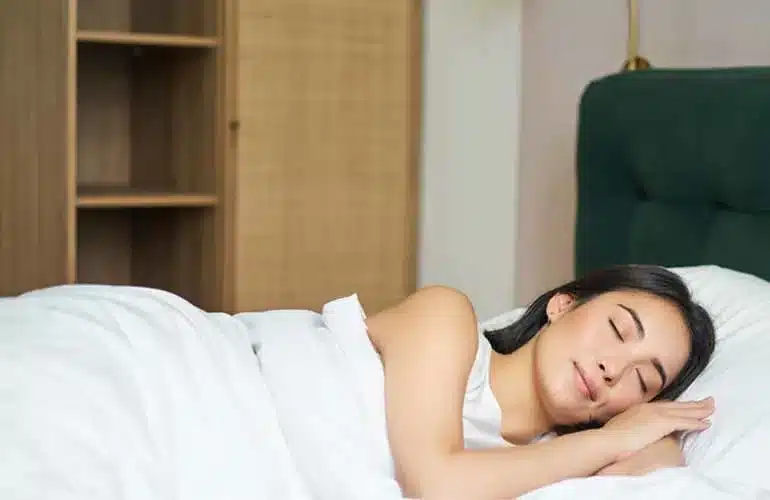 Egg donor resting comfortably at home after retrieval